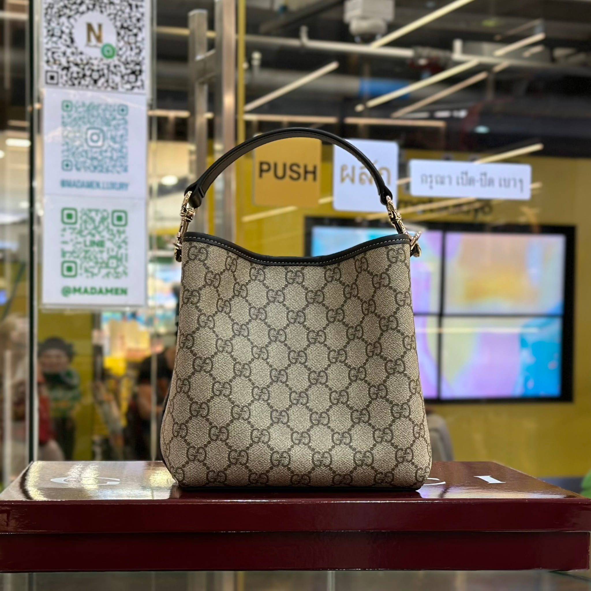 GUCCI GG Emblem Small Bucket Bag (2)